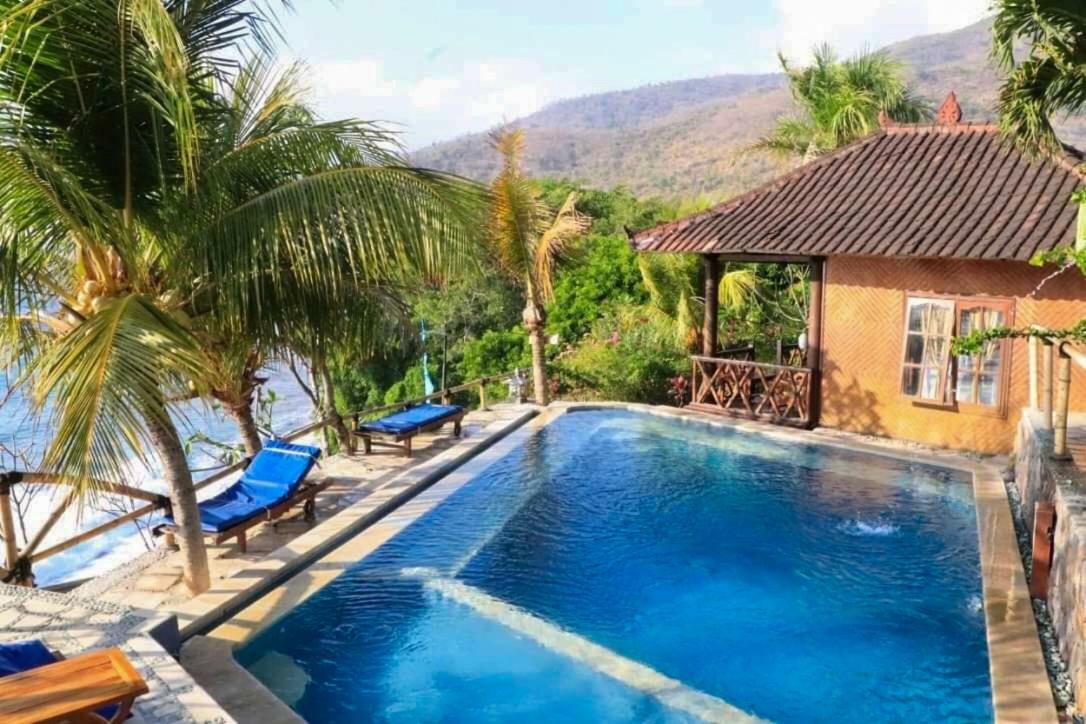 Eka Purnama Cottages Амед Экстерьер фото